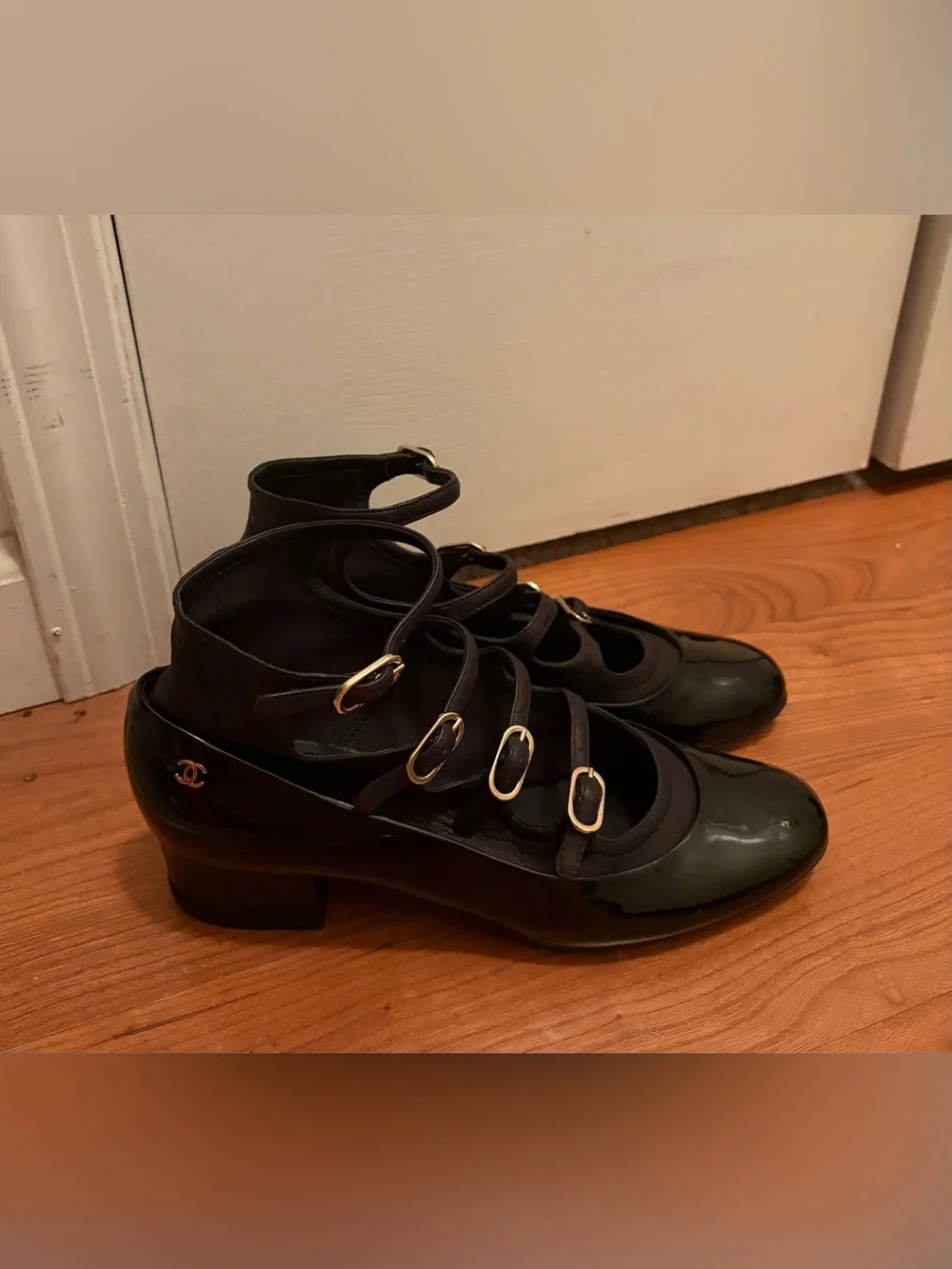 Authentic Chanel Mary Jane Pumps in excellent pre-owned condition.